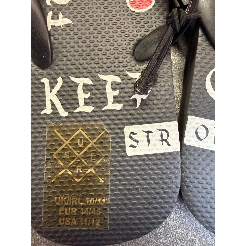 Primark Surf Mens Flip Flops Black Rose Graphic Keep Going Strong Size 11/12 NEW